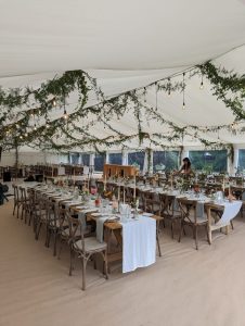black drop lights. long table wedding dining