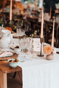 rustic tables. table runner. taper candle
